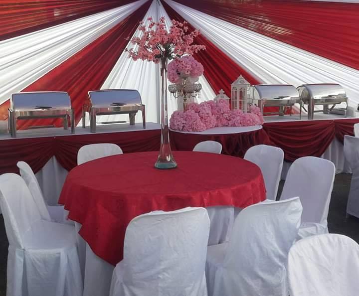 Full-service catering setup with guest tables and buffet stations
