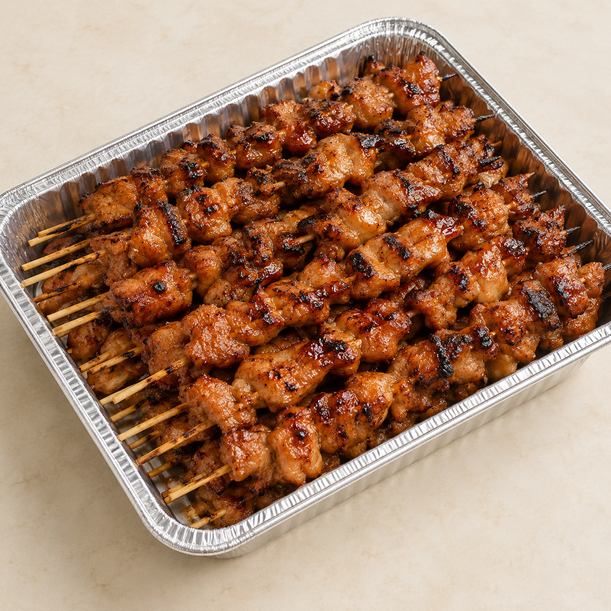 Chicken Skewers served in a catering tray